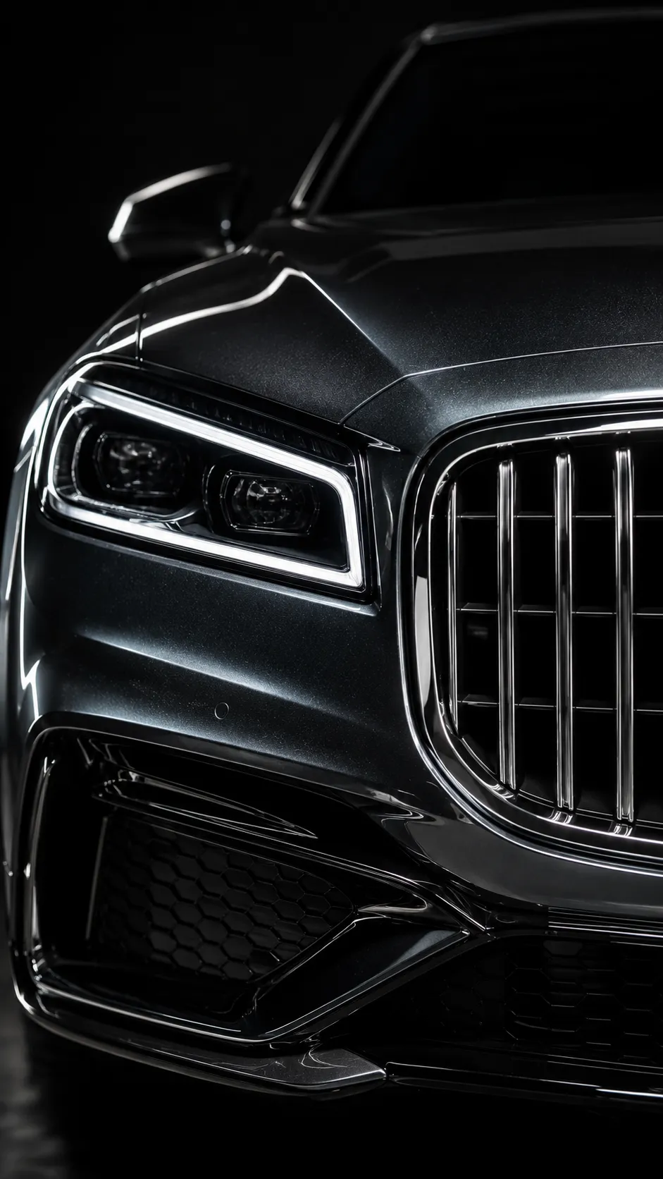 Close-up of Luxury Car Front Grille and Headlight Detail