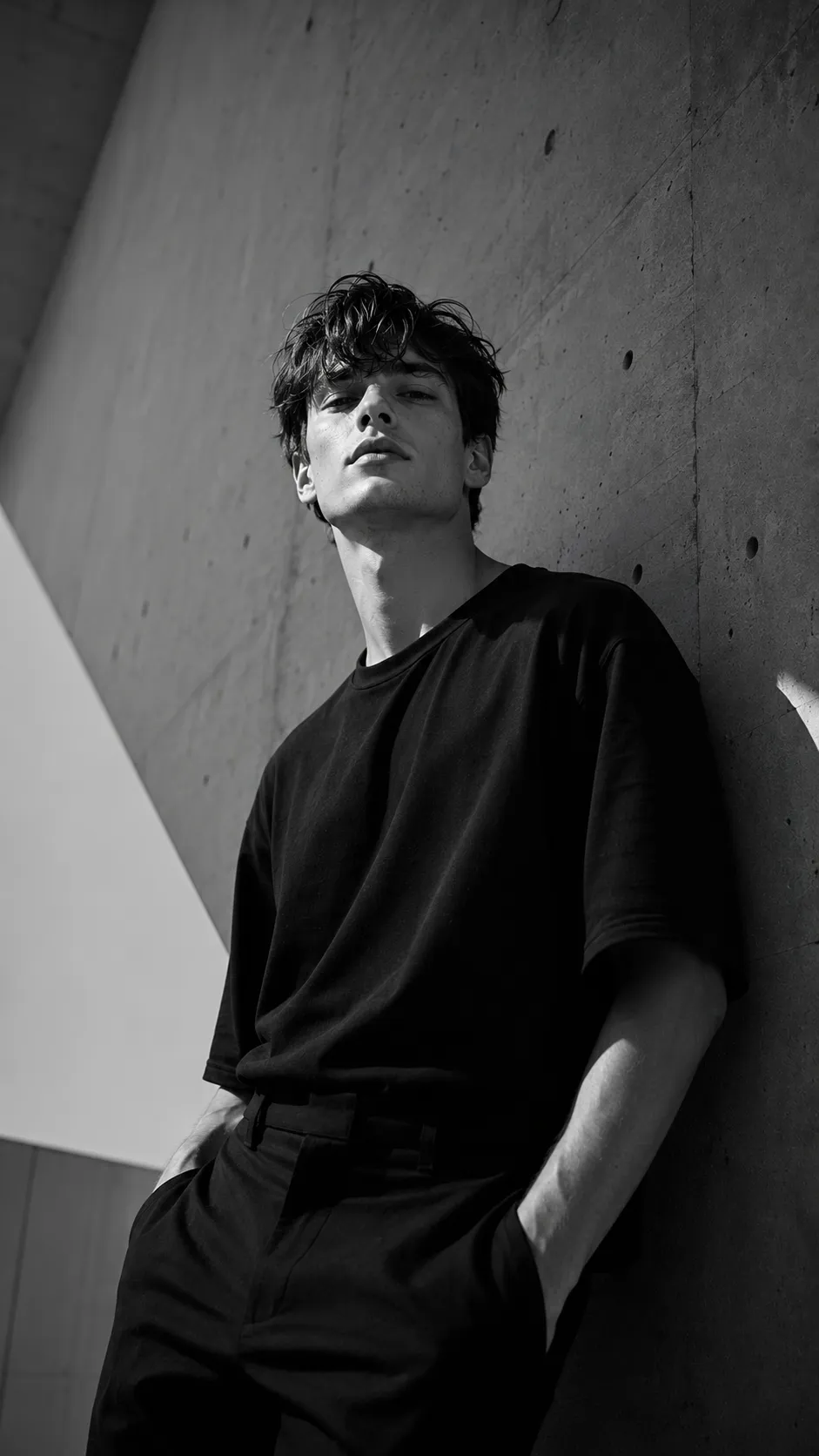 Moody black and white male portrait